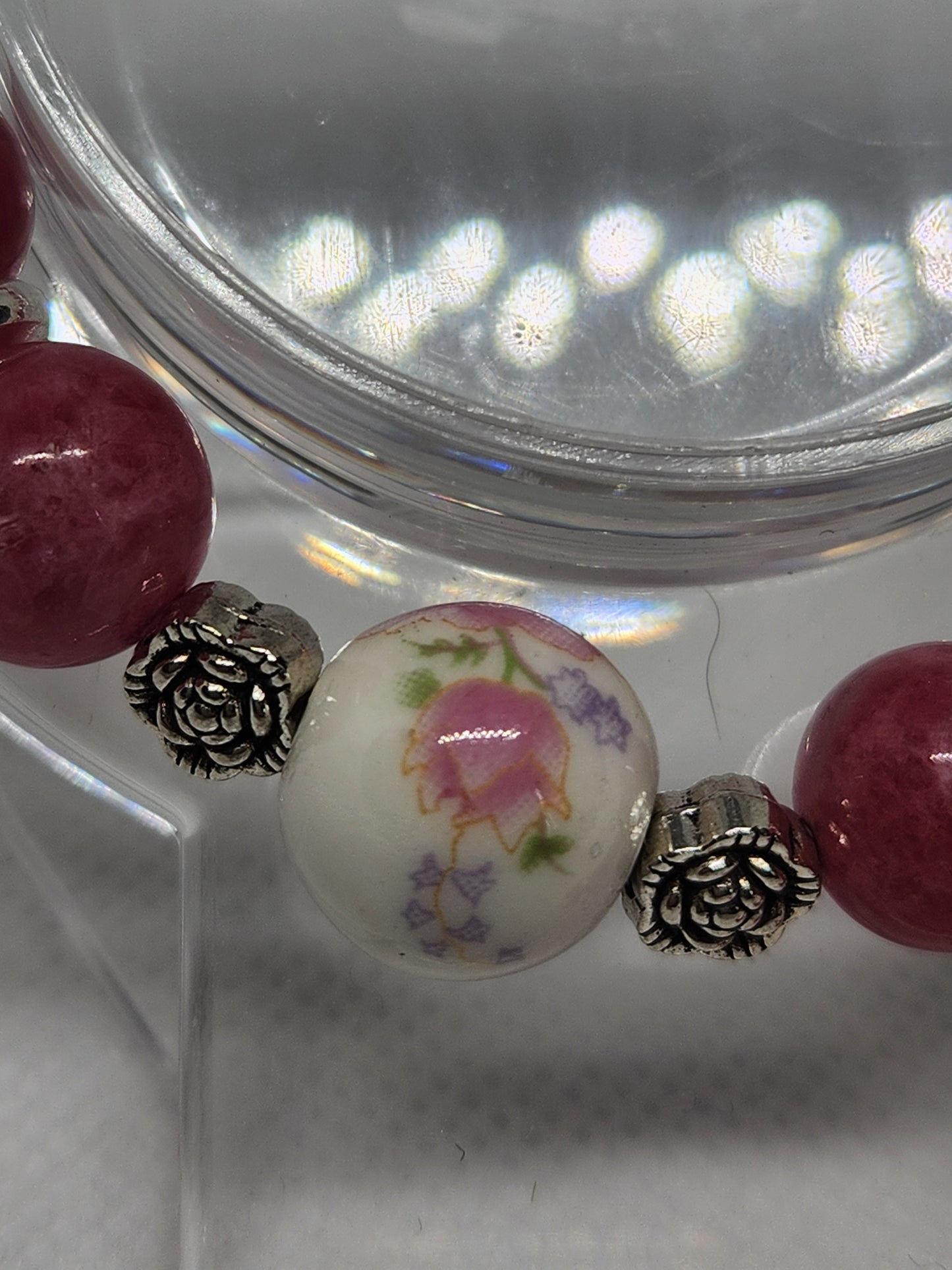 Handcrafted Rhodonite Bracelet with Ceramic Floral Bead