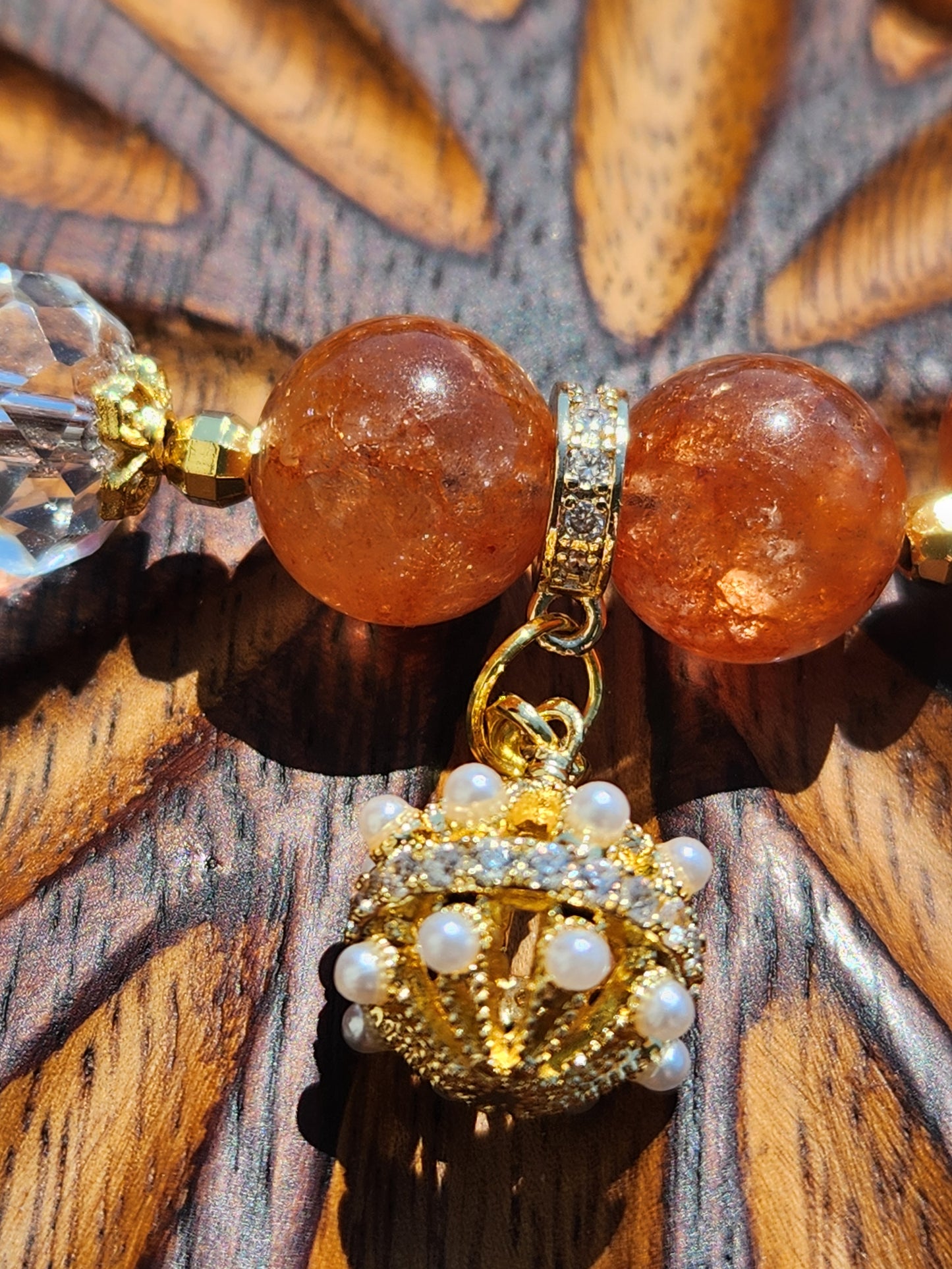 Orange Strawberry Quartz Bracelet with Fancy Dangle Charm and Gold-Tone Accents