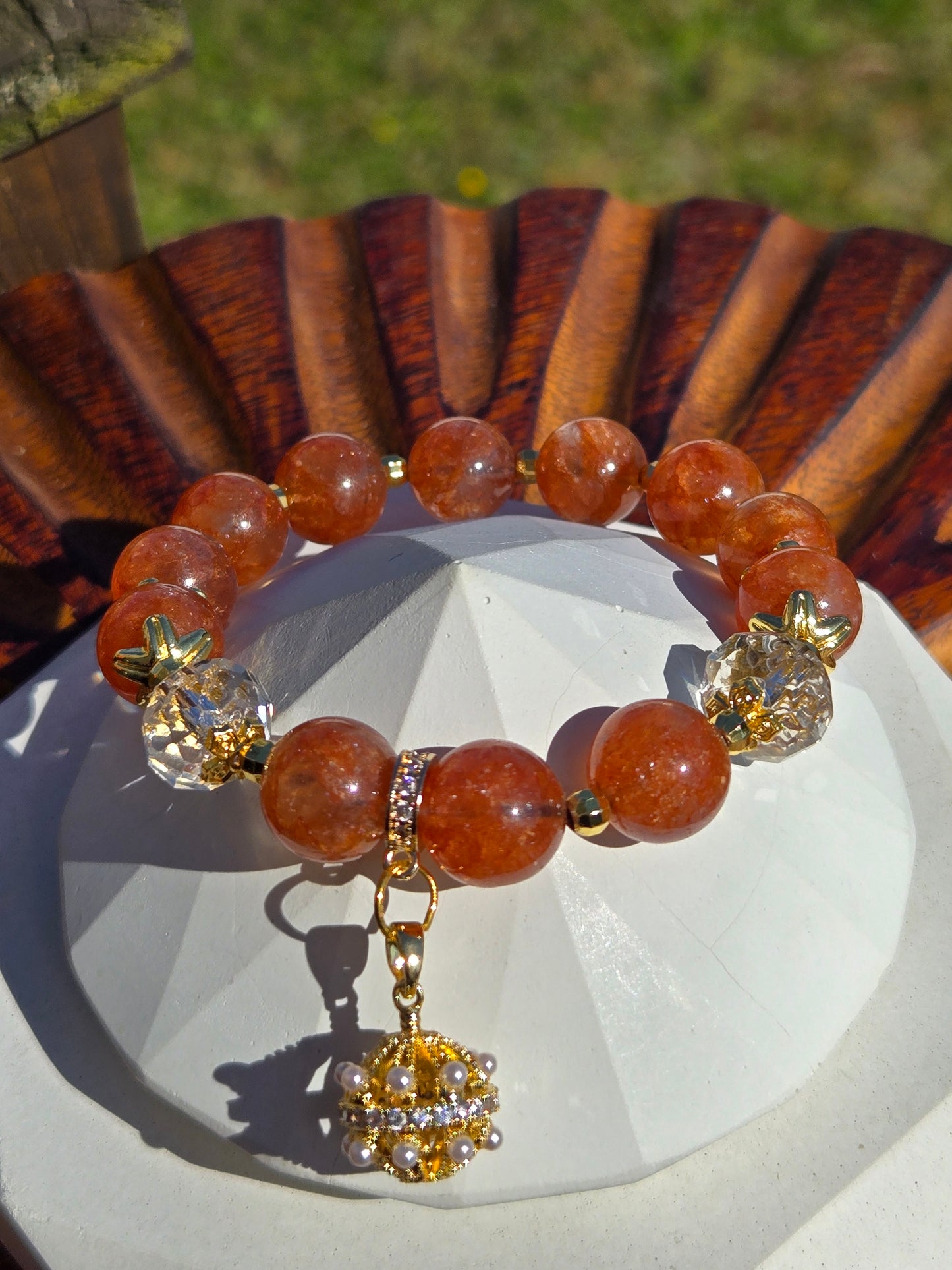 Orange Strawberry Quartz Bracelet with Fancy Dangle Charm and Gold-Tone Accents