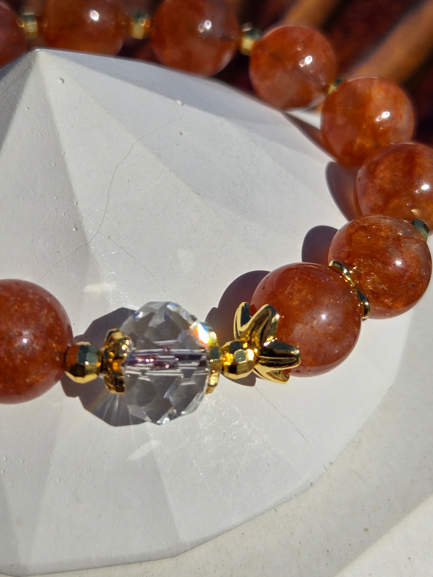 Orange Strawberry Quartz Bracelet with Fancy Dangle Charm and Gold-Tone Accents