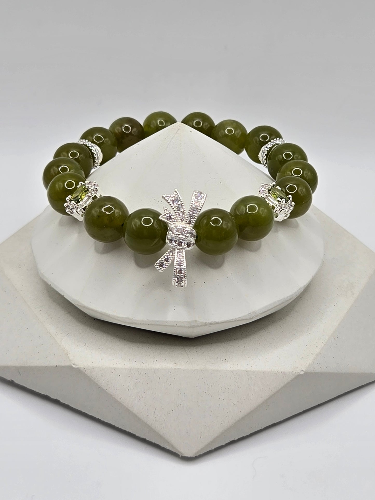 Olive Green Serpentine Bracelet with Sparkly Bow Charm – Elegant & Playful