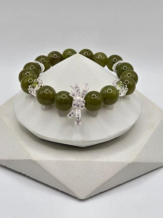 Olive Green Serpentine Bracelet with Sparkly Bow Charm – Elegant & Playful
