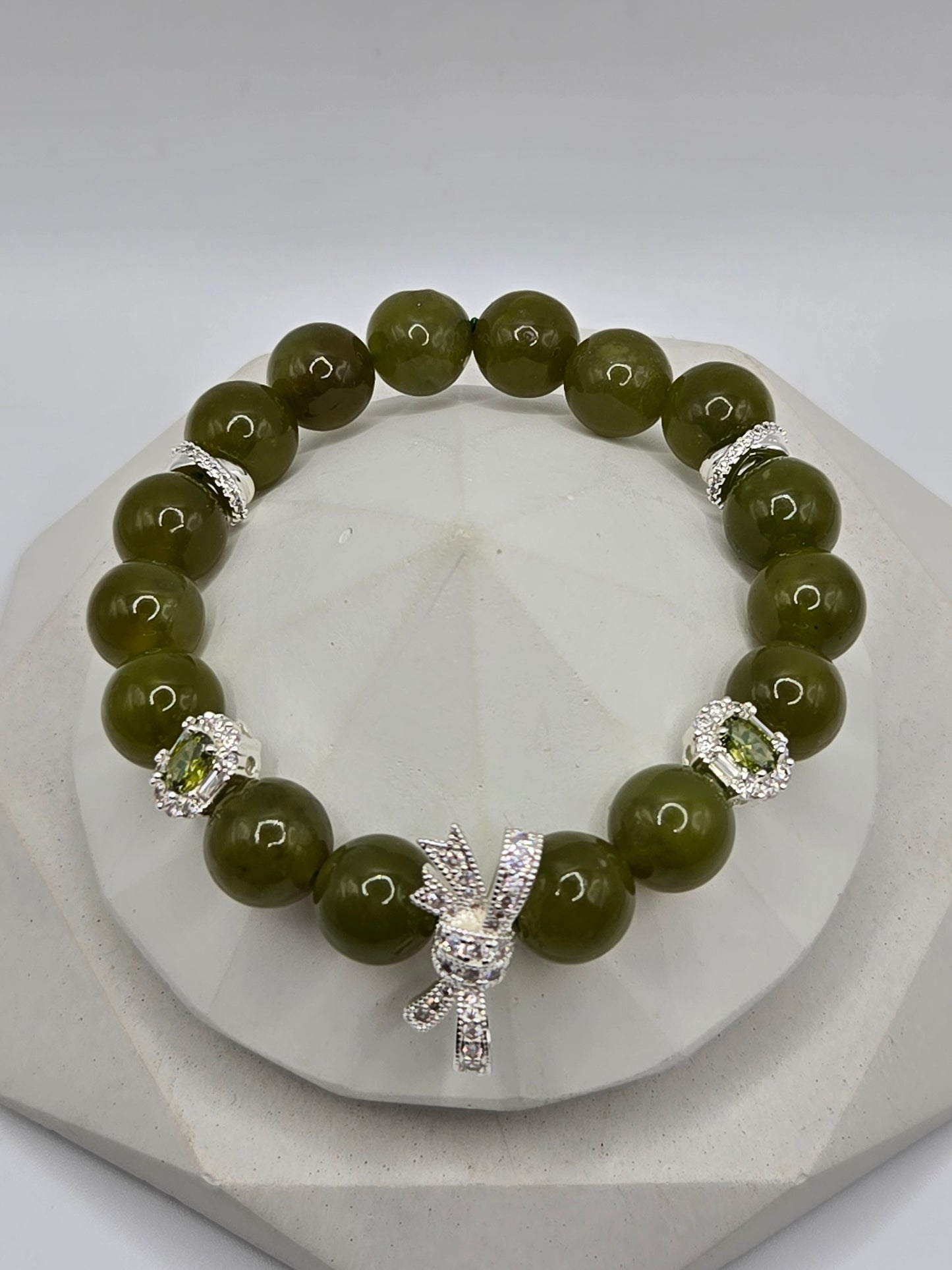 Olive Green Serpentine Bracelet with Sparkly Bow Charm – Elegant & Playful