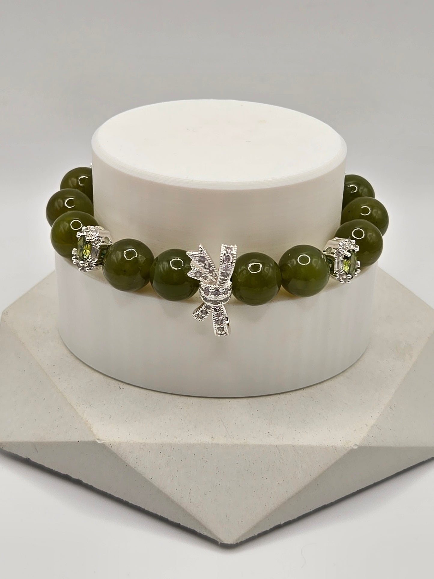 Olive Green Serpentine Bracelet with Sparkly Bow Charm – Elegant & Playful