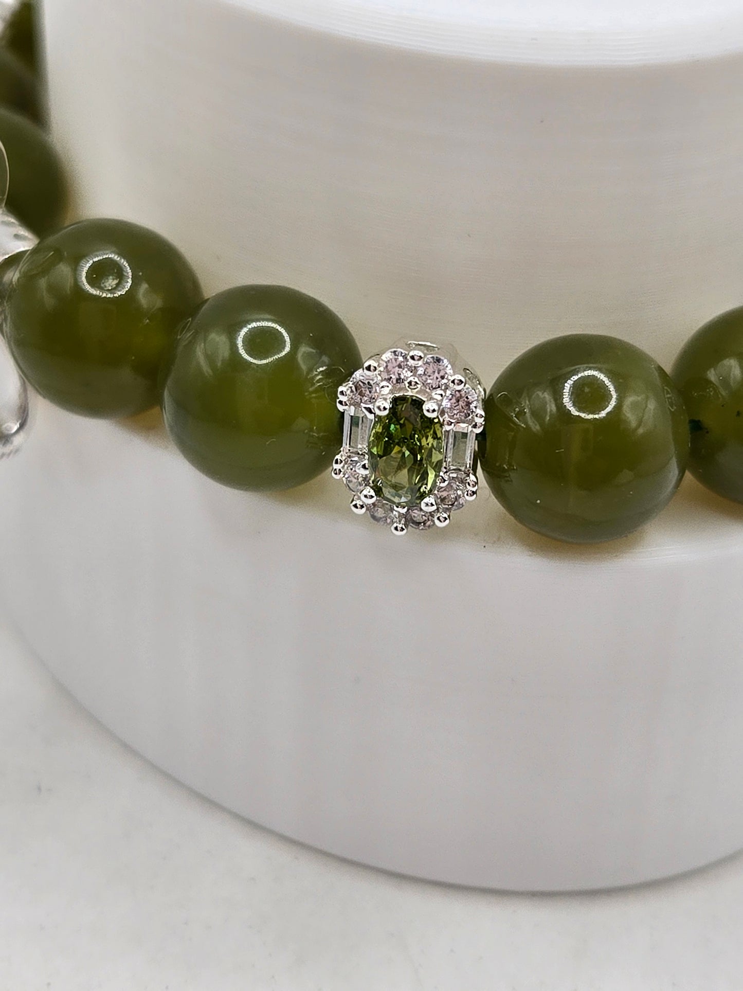 Olive Green Serpentine Bracelet with Sparkly Bow Charm – Elegant & Playful